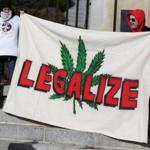 Marijuana supporters stood outside the State House on Dec. 30.