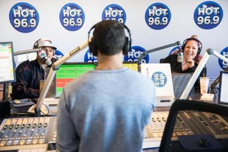 From left: Jermaine ?Wiggy? Wiggins, Ramiro Torres, and Melissa Eannuzzo broadcast Hot 96.9?s Ramiro, Pebbles, Melissa, and Wiggy morning show.
