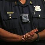 Boston Police Superintendent in Chief William Gross wears a body camera during a press conference in Sept. 2016.