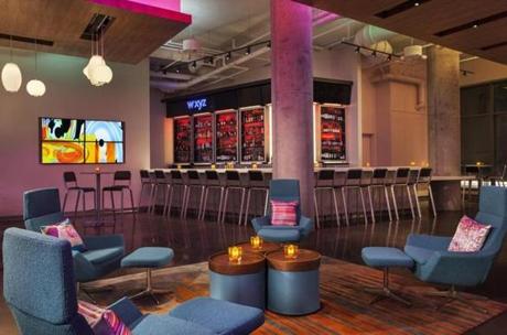 The bar at Aloft, a new hotel in the Seaport District, is a vibrant place to hang out.
