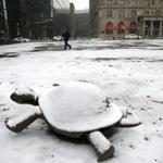 Light snow fell in Copley Square this morning. 