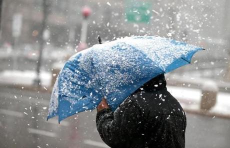 Boston Ma 03/14/2017 A gust of wind hits a umbrella in Copley Square. Boston Winter Storm Coverage. Jonathan Wiggs /GlobeStaff) Reporter:Topic

