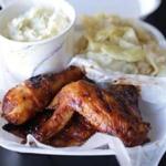 Barbecue chicken with potato salad and cabbage at Next Step Soul Food Cafe in Dorchester.