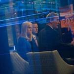 Seen through a window, ?Fox and Friends? hosts (from left to right) Ainsley Earhardt, Brian Kilmeade, and Steve Doocy.