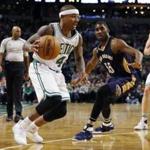 Boston Celtics' Isaiah Thomas (4) drives past New Orleans Pelicans' E'Twaun Moore (55) during the second quarter of an NBA basketball game in Boston, Saturday, Jan. 7, 2017. (AP Photo/Michael Dwyer)