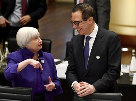 Janet Yellen, president of the Federal Reserve Board, and U.S. Treasury Secretary Steven Mnuchin talk to each others during the G20 finance ministers meeting in Baden-Baden, southern Germany, Friday, March 17, 2017. (Uwe Anspach/dpa via AP)
