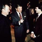 From left: The Rev. J. Donald Monan, President Reagan, and Doug Flutie in an undated photo.