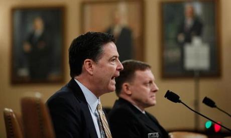 FBI Director James Comey (left) testified next to you National Security Agency Director Michael Rogers on Capitol Hill in Washington, D.C., Monday. 
