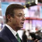 FILE - In this July 17, 2016, file photo, then-Trump campaign chairman Paul Manafort talks to reporters on the floor of the Republican National Convention in Cleveland. U.S. Treasury Department agents have recently obtained information about offshore financial transactions involving Manafort, as part of a federal anti-corruption probe into his work in Eastern Europe, The Associated Press has learned. (AP Photo/Matt Rourke, File)