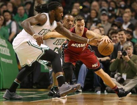 Boston MA 3/26/17 Boston Celtics Jae Crowder steals the ball from Miami Heat Goran Dragic during second quarter action at the TD Garden. (Photo by Matthew J. Lee/Globe staff) topic: reporter: 
