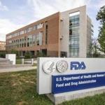 FILE - This Oct. 14, 2015, file photo shows the Food and Drug Administration campus in Silver Spring, Md. The FDA announced Monday, Dec. 12, 2016, that it denied the request by Swedish Match to remove several health warnings from its smokeless tobacco pouches, though regulators left open the possibility for other labeling changes it seeks. It's the first decision of its kind handed down by the agency since it gained authority to review the relative risks of tobacco products in 2009. (AP Photo/Andrew Harnik, File)