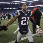 New England Patriots cornerback Malcolm Butler (21) leaves the field after an NFL divisional playoff football game against the Houston Texans, Saturday, Jan. 14, 2017, in Foxborough, Mass. (AP Photo/Elise Amendola)