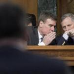 Senators Richard Burr (right) and Mark Warner spoke during the Senate Intelligence Committee hearing. 