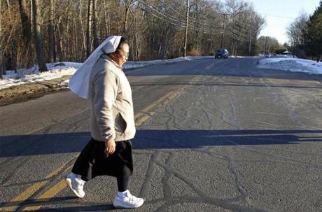 Sister Francoise Rasoarivao crossed Route 118 where the LaSalette Shrine hopes Attleboro will grant them a crosswalk.
