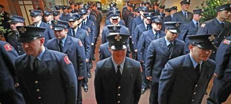Firefighters were sworn in after graduating from the Boston Firefighting Academy.
