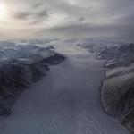 ELLESMERE ISLAND, CANADA - MARCH 29: A section of a glacier is seen from NASA's Operation IceBridge research aircraft on March 29, 2017 above Ellesmere Island, Canada. The ice fields of Ellesmere Island are retreating due to warming temperatures. NASA's Operation IceBridge has been studying how polar ice has evolved over the past nine years and is currently flying a set of eight-hour research flights over ice sheets and the Arctic Ocean to monitor Arctic ice loss aboard a retrofitted 1966 Lockheed P-3 aircraft. According to NASA scientists and the National Snow and Ice Data Center (NSIDC), sea ice in the Arctic appears to have reached its lowest maximum wintertime extent ever recorded on March 7.Scientists have said the Arctic has been one of the regions hardest hit by climate change. (Photo by Mario Tama/Getty Images)