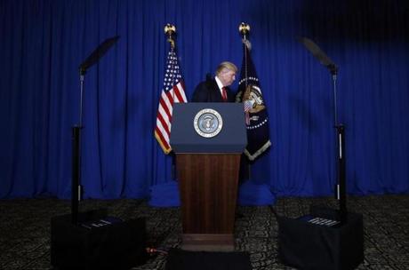 President Donald Trump walks from the podium after speaking at Mar-a-Lago in Palm Beach, Fla., Thursday, April 6, 2017, after the U.S. fired a barrage of cruise missiles into Syria Thursday night in retaliation for this week's gruesome chemical weapons attack against civilians. (AP Photo/Alex Brandon)
