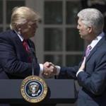 President Trump shook hands with Neil M. Gorsuch during the Rose Garden ceremony on Monday.