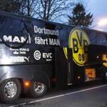 TOPSHOT - Borussia Dortmund's damaged bus is pictured after an explosion some 10km away from the stadium prior to the UEFA Champions League 1st leg quarter-final football match BVB Borussia Dortmund v Monaco in Dortmund, western Germany on April 11, 2017. / AFP PHOTO / Patrik STOLLARZPATRIK STOLLARZ/AFP/Getty Images