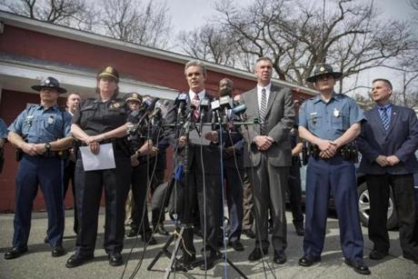 April 15, 2017 | Priceton, MA Press conference at Priceton, Mass police station to announce the suspected killer of jogger Vanessa Marcotte last summer. Angelo Colon-Ortiz is suspected. Pictured center, Worcester county DA Joseph D. Early Jr. To his left, light suit, Richard D Mckeon Kernel of the state police. To Worcester DA right, Priceton police chief, Michele Powers. Kieran Kesner for The Boston Globe. 
