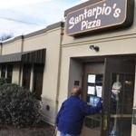 Customers enter Santarpio?s Pizza on Route 1 North in Peabody.