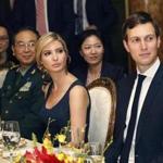 FILE - In this Thursday, April 6, 2017, file photo, Ivanka Trump, second from right, the daughter and assistant to President Donald Trump, is seated with her husband, White House senior adviser Jared Kushner, right, during a dinner with President Donald Trump and Chinese President Xi Jinping at Mar-a-Lago in Palm Beach, Fla. Earlier in the day, Ivanka Trump's company received provisional approval from the Chinese government for three new trademarks, winning monopoly rights to sell Ivanka brand jewelry, bags and spa services in the world's second-largest economy. (AP Photo/Alex Brandon, File)