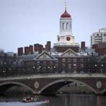 Rowers paddled down the Charles River near the campus of Harvard University in Cambridge, Mass.