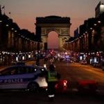 Police officers blocked the access to the Champs Elysees in Paris after a shooting on Thursday.