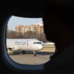 American Airlines grounded a flight attendant who got into a verbal confrontation with a passenger on Friday. 