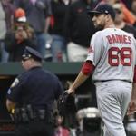 Boston Red Sox pitcher Matt Barnes walks off the field after being ejected for throwing at Manny Machado during the eighth inning of a baseball game, Sunday, April 23, 2017 in Baltimore. The Red Sox won 6-2. (AP Photo/Gail Burton)