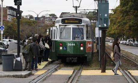 The MBTA has been reconfiguring traffic lights to give Green Line trains priority over street traffic, and officials hope to make the changes permanent in the fall. 
