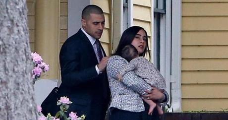 Bristol, Connecticut -- 4/24/2017 - Shayanna Jenkins-Hernandez holds her daughter's hand as she walks into O'Brien Funeral Home for Aaron Hernandez's funeral. (Jessica Rinaldi/Globe Staff) Topic: 25hernandezfuneral Reporter: 
