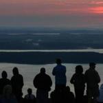 Visitors watched the sun rise from atop Cadillac Mountain in Acadia National Park. Maine locations have become official names for several places on Mars.