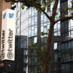 Twitter shares rose nearly 8 percent Wednesday on news that the service added users and revenue fell less than expected.