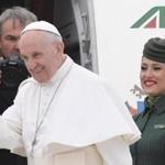 Pope Francis waves to the press as he is welcomed by Alitalia's personnel prior his flight to Egypt, on April 28, 2017 at Rome's Fiumicino airport. Pope Francis heads for a two-day visit in Egypt for talks with the grand imam of the capital's famed Al-Azhar mosque in Cairo, but also to show solidarity with Coptic Christians targeted by violence in Egypt. / AFP PHOTO / Tiziana FABITIZIANA FABI/AFP/Getty Images
