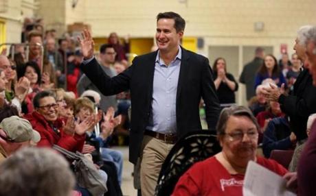 Representative Seth Moulton arrived for a town hall meeting at North Shore Community College in Lynn on April 8.
