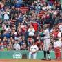 Fenway fans cheered for Adam Jones in the first inning Tuesday after he had been subjected to racial abuse the night before.