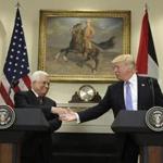 President Donald Trump shook hands with Palestinian leader Mahmoud Abbas during their news conference at the White House on Wednesday.