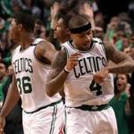 Boston, MA - 5/02/2017 - (4th quarter/overtime) Celtics fans and Boston Celtics guard Isaiah Thomas (4) know it was Isaiah time after Thomas put the final nail in the coffin with a short jumper to give Boston a 129-119 win over the Washington Wizards. The Boston Celtics host the Washington Wizards in Game 2 of the Eastern Conference Semi-Finals at TD Garden. - (Barry Chin/Globe Staff), Section: Sports, Reporter: Adam Himmelsbach, Topic: 03Celtics-Wizards, LOID: 8.3.2378366642.