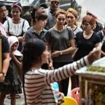 Jiranuch Trirat (center), 22, was comforted by friends as she stood near the coffin of her 11-month-old daughter Natalie during her funeral rites in Phuket, Thailand, on April 29. The infant was murdered by her father in a harrowing video he broadcast live on Facebook before committing suicide.