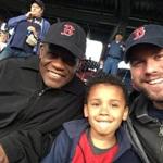 This is (right to left) Calvin Hennick, his six-year-old son, Nile, and Hennick's father in law, Guy Mont-Louis. They were attending Tuesday night's game at Fenway Park..