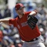 Boston Red Sox starting pitcher Kyle Kendrick delivers to the Tampa Bay Rays during the first inning of a spring training baseball game Wednesday, March 15, 2017, in Port Charlotte, Fla. (AP Photo/Chris O'Meara)