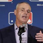 Major League Baseball Commissioner Rob Manfred answers questions at a news conference Tuesday, Feb. 21, 2017, in Phoenix. (AP Photo/Morry Gash)