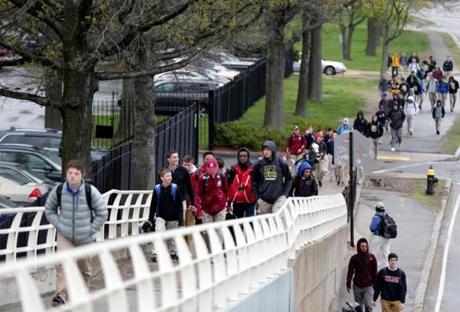 05/05/2017 Boston Ma Boston College High School Male students leave their school. The school may be considering admitting female students. Boston Globe Staff\Photograph Jonathan Wiggs Reporter:Topic
