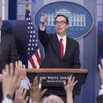 epa05929377 US Treasury Secretary Steven Mnuchin (R) and National Economic Director Gary Cohn (L) participate in a news conference to discuss the tax reform plan of US President Donald J. Trump, in the James Brady Press Briefing Room at the White House in Washington, DC, USA, 26 April 2017. EPA/MICHAEL REYNOLDS