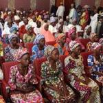 This photo taken on Oct. 19, 2016, shows 21 Chibok girls who were released by Boko Haram a week earlier.