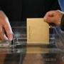 A man cast his ballot early Sunday in Saint Jean de Luz, in southwestern France.