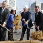 General Electric CEO Jeff Immelt, center right, takes part in a ceremonial groundbreaking along with, from left, Massachusetts Gov. Charlie Baker, GE Vice President of Boston Development and Operations Ann Klee and Boston Mayor Marty Walsh, at the site of GE's new headquarters, Monday, May 8, 2017, in Boston. (AP Photo/Michael Dwyer)
