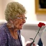 East boston-05/10/2017- The annual Boston Golden Age Mother's day celebration was held at Spinelli's Banguet Hall attended by several dozen seniors. Marie Cavallaro, age 99, holds a red carnation given to her. / The BostonGlobe (metro)