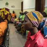 Some of the recently released girls from Chibok wait in Abuja on May 8, 2017. The United Nations on May 8, 2017 welcomed the release of 82 Nigerian schoolgirls after years of Boko Haram captivity and appealed to their families and communities not to ostracize them. The teenage girls who were among more than 200 kidnapped in 2014 from the Government Girls Secondary School in Chibok, northeast Nigeria, northeast Nigeria, were freed on May 6, 2017 after a prisoner swap agreed with the Islamist group. / AFP PHOTO / STEFAN HEUNISSTEFAN HEUNIS/AFP/Getty Images